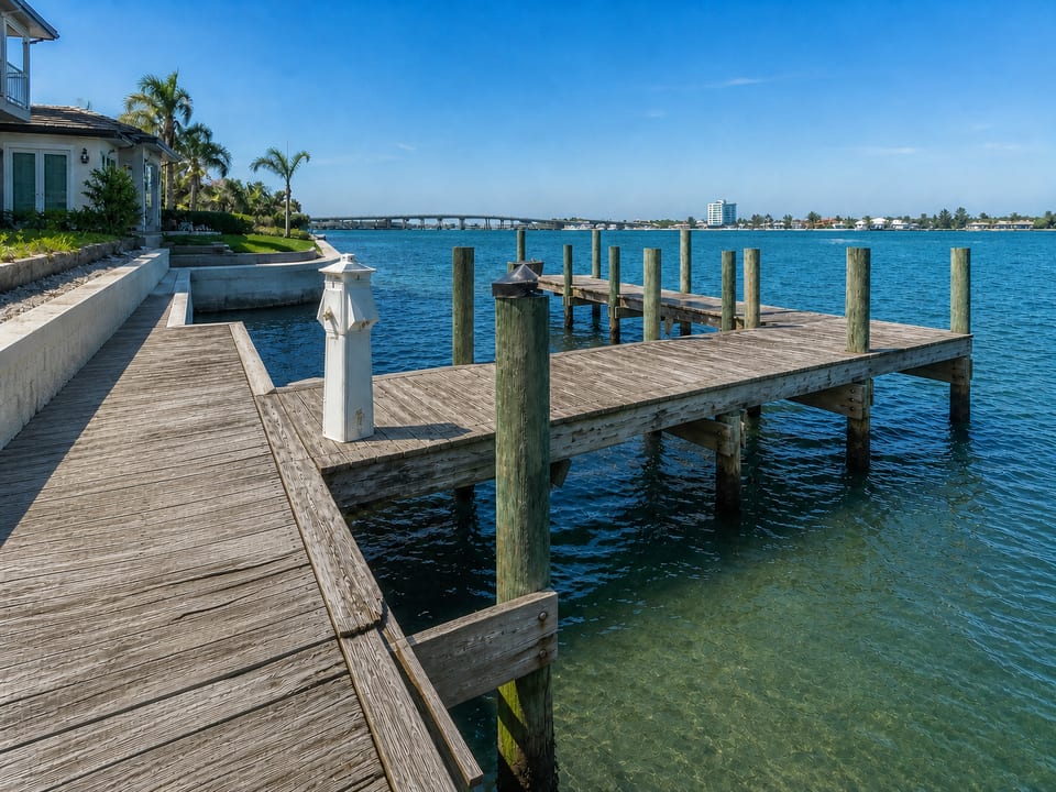 Illustration of a weathered residential dock with uneven and raised deck boards.